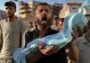 مواطن يحمل جنين قتله الاحتلال في غزة.webp