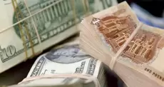 الجنيه والدولار.webp