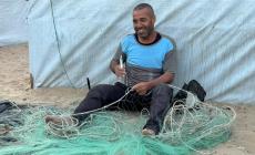 صيادو الأسماك في غزة يتحدون قذائف الاحتلال لكسب قوت أطفالهم