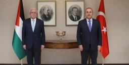 وزير الخارجية التركي مولود أوغلو ووزير الخارجية الفلسطيني رياض المالكي