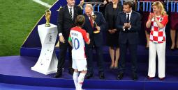 Luka_Modrić_receives_the_golden_ball_prize_at_the_hands_of_Russian_President_Vladimir_Putin.jpg