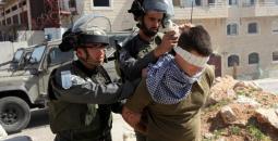 اعتقال فتى فلسطيني.jpeg.opdownload