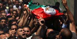 تشييع جثمان شهيد فلسطيني.jpg