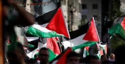 رفع علم فلسطين في فعالية بالضفة الغربية.jpg