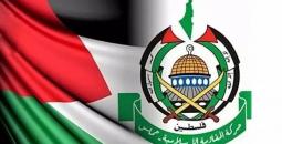 حماس.. الشعار وعلم فلسطين.jpg