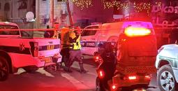 من مكان جريمة إطلاق نار سابقة في اللد.jpg