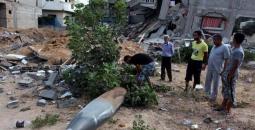 الشرطة تتعامل مع صاروخ إسرائيلي لم ينفجر في غزة.jpg