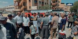 وقفة بمدينة خانيونس تطالب بتأمين الأدوية والمستلزمات الطبية للقطاع الصحي