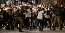 اعتداء المستوطنين في الخليل.webp