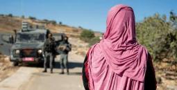 سيدة فلسطينية تمنع من الوصول لمنزلها.jpg