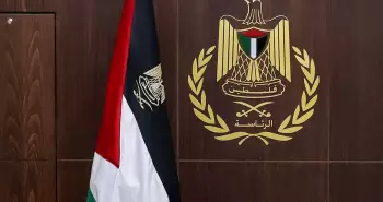 شعار الرئاسة الفلسطينية وعلم فلسطين.webp