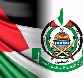 حماس.. الشعار وعلم فلسطين.jpg
