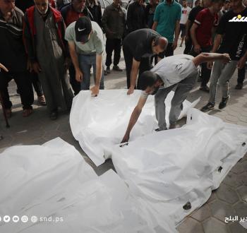 مجزرة دير البلح.jpg