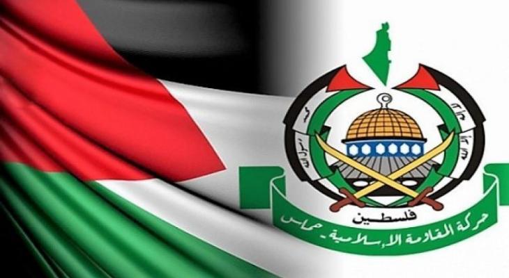 شعار حركة حماس مع العلم الفلسطيني.jpeg