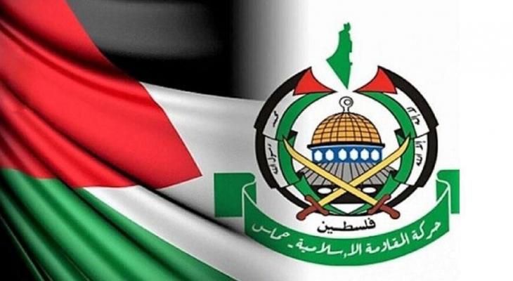 شعار حركة حماس مع العلم الفلسطينيjpg