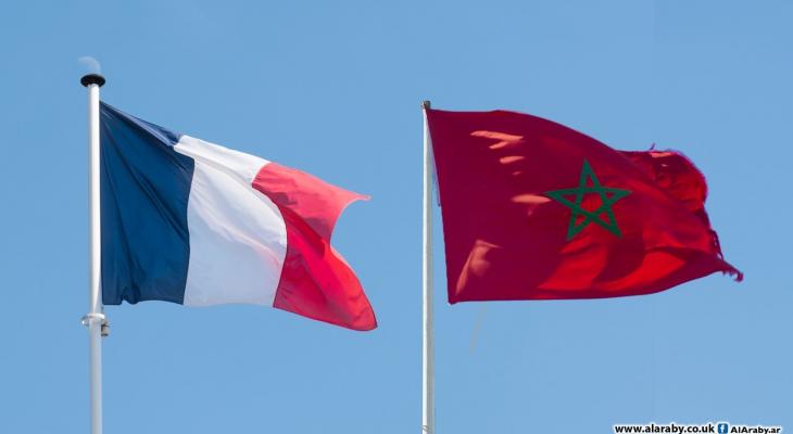 علما المغرب (يمين الصورة) وفرنسا (يسارًا).jpeg