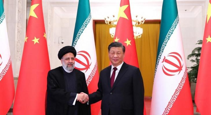 الرئيس الصيني رفقة نظيره الإيراني.jpg