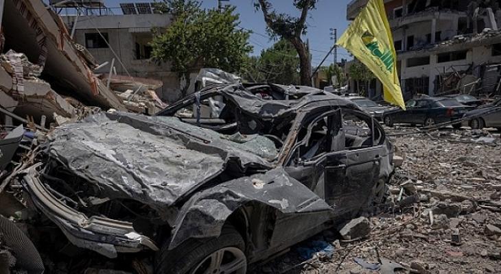 رفع راية حزب الله في مكان استهداف إسرائيلي