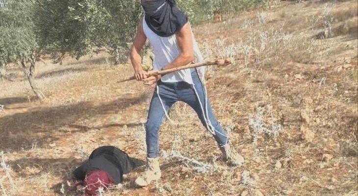 اعتداء مستوطنين على سيدة فلسطينية.jpg