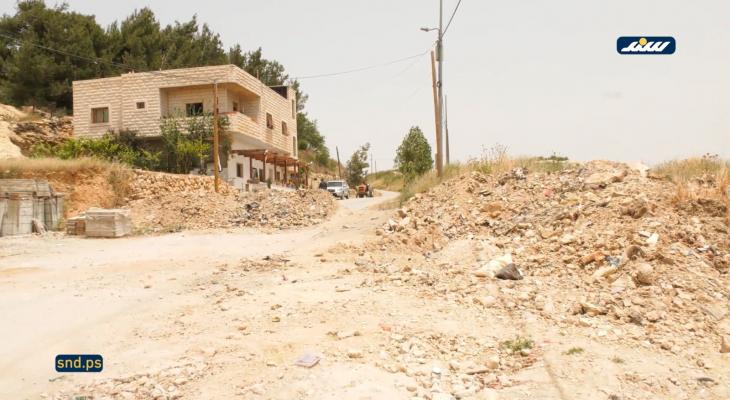 سواتر ترابية في بيت أمر
