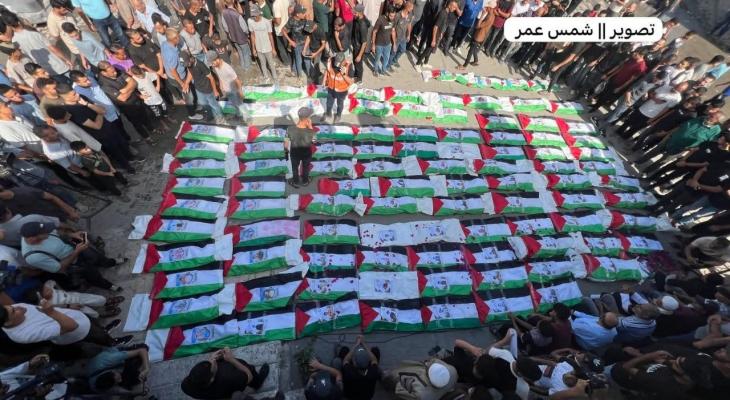 تشييع جثامين أكثر من 100 شهيد بغزة.jpg