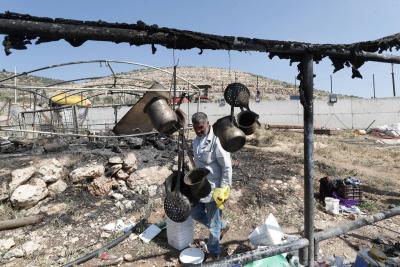 أضرار في ممتلكات فلسطيني بقرية المغير قرب رام الله.jpeg