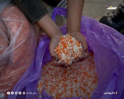 في ظل المجاعة والإبادة.. طحن الأرز والعدس بديل الطحين في قطاع غزة 4.jpg