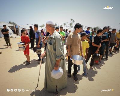 الجوع ينهش أطفال غزة.. طوابير لا تنتهي وأيادٍ صغيرة تمتدّ بحثًا عن الطعام8.jpg
