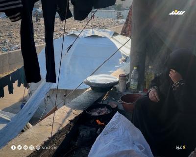 الطهو على النار في غزة.jpg