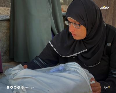 وداع وتشييع  جثماني شهيدين ارتقيا جراء قصف الاحتلال مجموعة من المواطنين أمس في جباليا شمالي قطاع غزة1.jpg