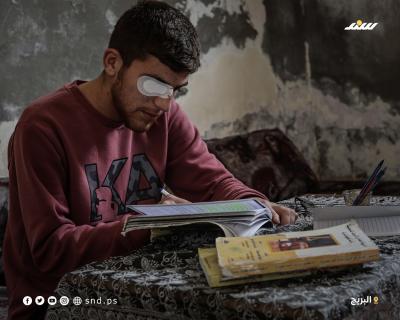 حمزة الحشاش يواصل تعليمه الجامعي بعين واحدة وجروح خطيرة في قطاع غزة7.jpg