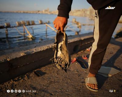 مشاهد من آثار قصف قوات الاحتلال لمجموعة من المواطنين داخل ميناء غزة البحري7.jpg