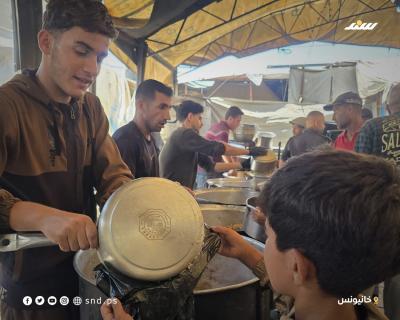 أطفال في تكية.jpg