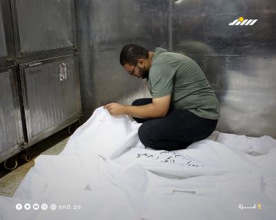 وصول جثامين 20 شهيدًا بينهم أطفال إلى مجمع الشفاء الطبي5.jpg