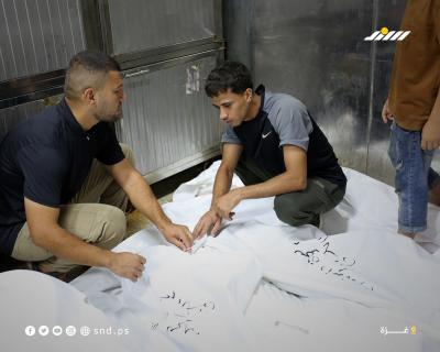 وصول جثامين 20 شهيدًا بينهم أطفال إلى مجمع الشفاء الطبي3.jpg