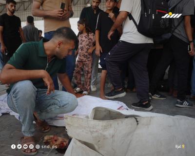 فلسطينيون يودّعون أحبّتهم في مستشفى الشفاء بمدينة غزة بعدما استشهدوا في هجوم إسرائيلي7.jpg