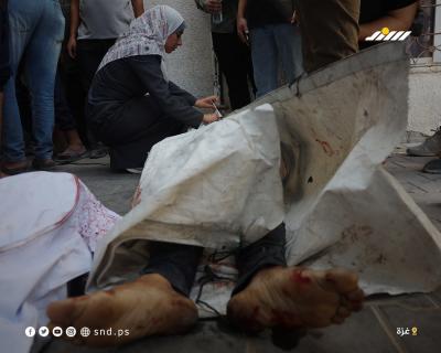 فلسطينيون يودّعون أحبّتهم في مستشفى الشفاء بمدينة غزة بعدما استشهدوا في هجوم إسرائيلي8.jpg