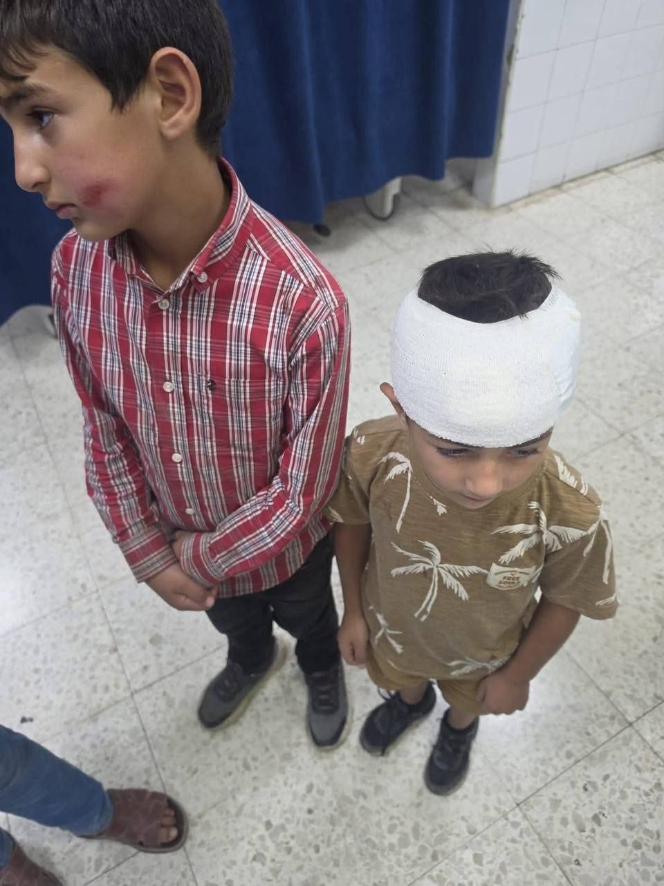 إصابة طفلين بهجوم للمستوطنين.jpg